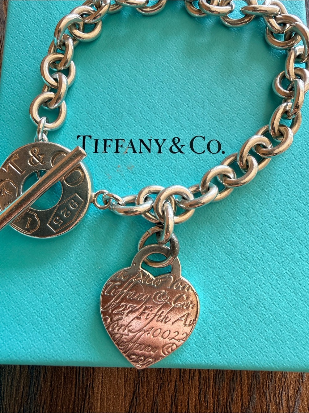 Tiffany & Co. Sterling Silver Heart Tag Charm Bracelet on Tiffany Blue
